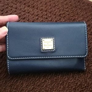 Dooney and Bourke flap wallet.  Midnight Blue